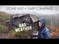 Wind  rain camping in tiny stone hut with tarp for roof attempt 3