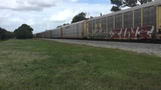 FEC TRAIN 109#2075@11:59am long train with 69 autos/3geeps