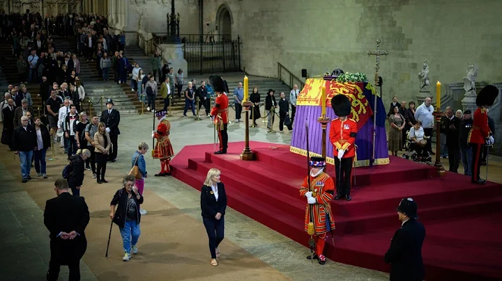 Man detained after rushing to the Queen's coffin i...