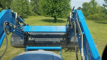 LS XR4140HC Tractor Doing Loader Work