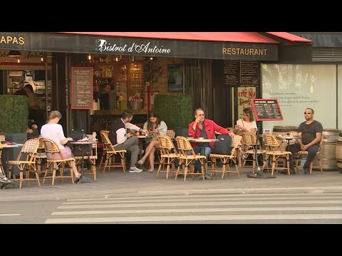 Vidéo: Visite photo des terrasses des cafés parisiens