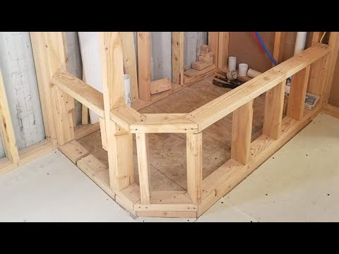 #26-roman-shower/tub-continues-in-our-container-home