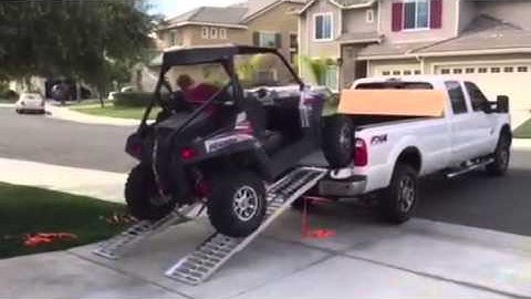 Loading my RZR800s in the bed of an F350