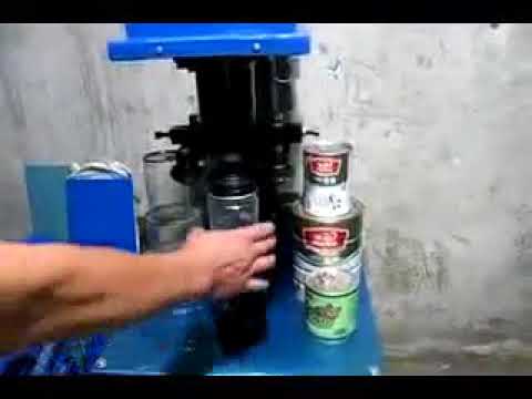 Video máy dập nắp hộp bán tự động DGT41A, máy đóng nắp lon... - youtube