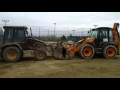 Cat vs. JCB