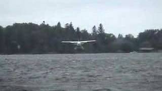 cessna floatplane perfect landing on water
