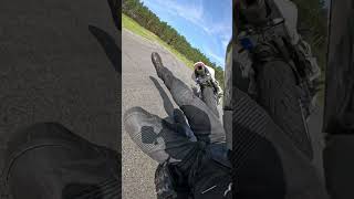 Motorcycle Racing Mishap During Sharp Corner Navigation
