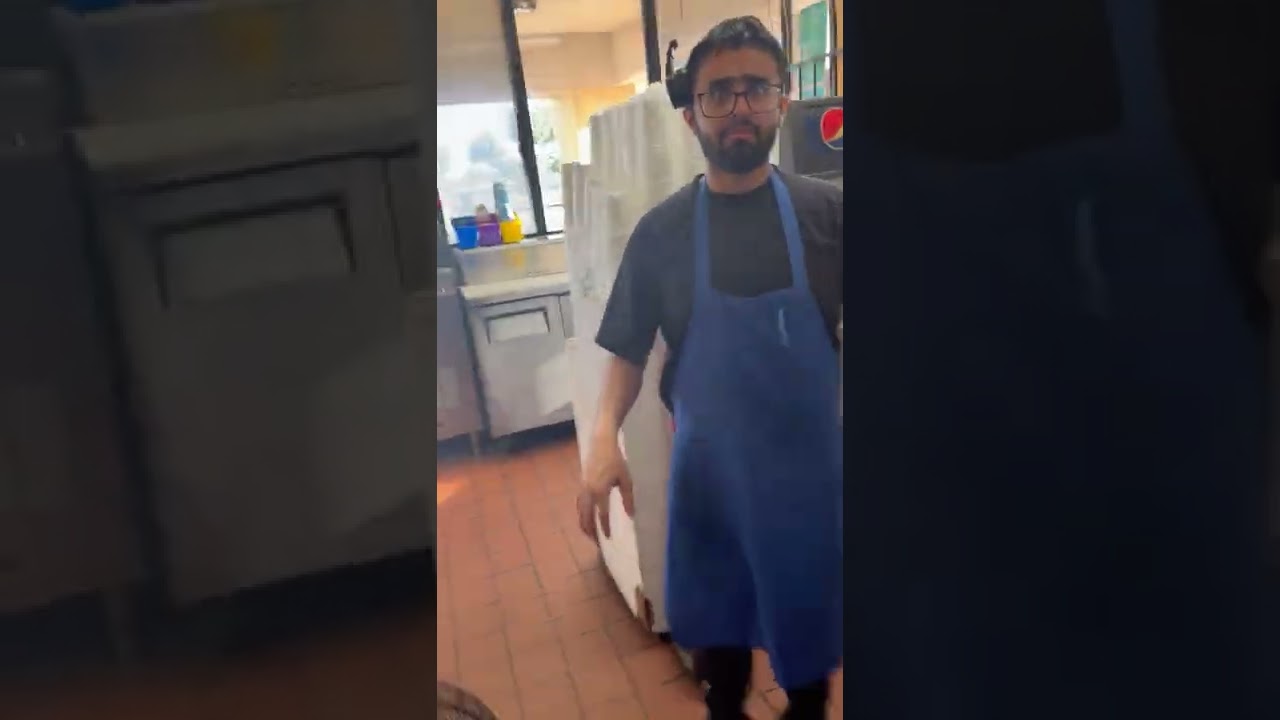 Girl Screams And Scares Guy In Blue Apron