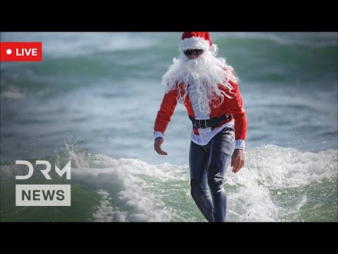 Santas Swap Sleighs for Surfboards at Cocoa Beach Surfing Santas