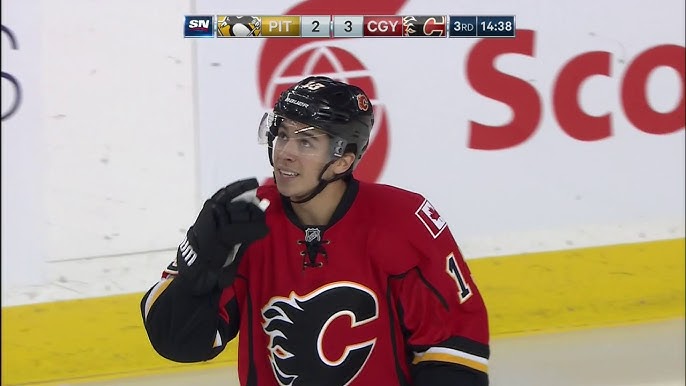 Sean Monahan Gives Johnny Gaudreau a Hug