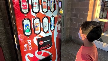 Rian getting Coke Zero from the vending machine