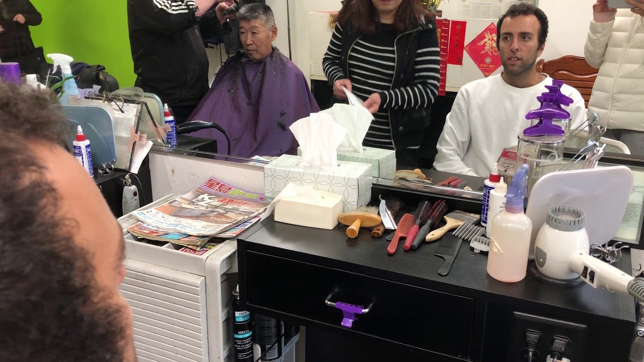 Michael Niktaris gets a haircut in Chinatown YouTube