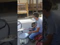 Teenager playing the drum