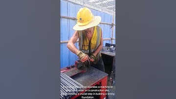 The process of a construction worker bending rebar on a job site