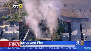 Fire Torches Building After Sparking At Venice Homeless Camp