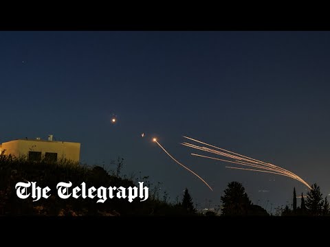 Hezbollah fires dozens of missiles at Israel