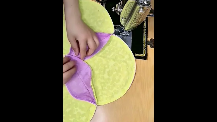 Sew throw pillows with nine round pieces of fabric