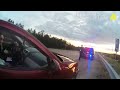 Woman Hits Police Car Carrying an Arrestee