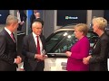 Chancellor merkel visits the joint booth of fev and business partner microsoft at iaa 2019