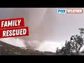 Hurry get inside storm chaser rescues family during large tornado