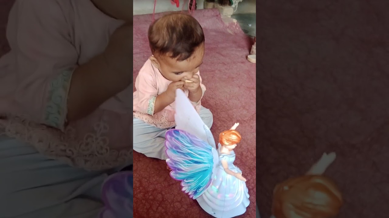 Zahra is eating an apple. 