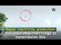 Nepal electricity production disrupted after man clings to transmission line