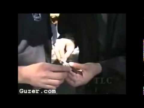 Cigarette Through Coin trick by David Blaine