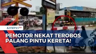 Detik-Detik Pemotor Nyaris Terlindas Usai Nekat Terobos Palang Pintu Kereta