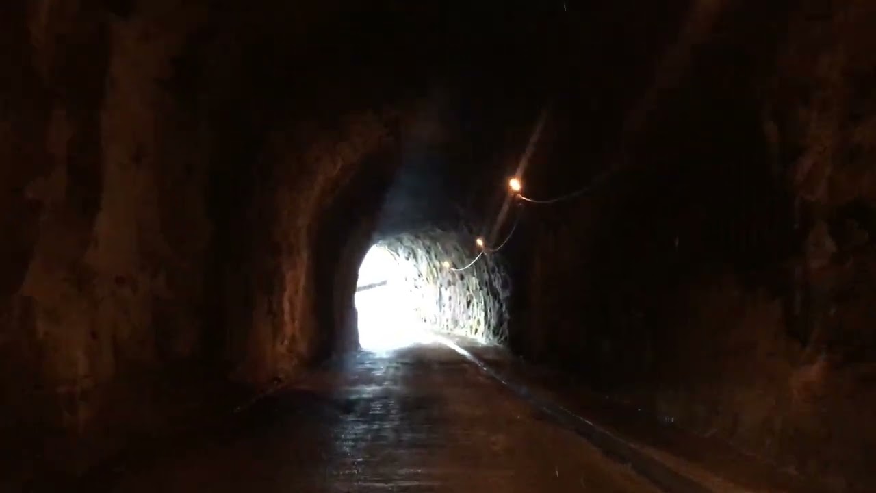Going through the tunnel in Antiga ER101 road in Madeira, Portugal
