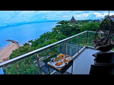 The Golden Tulip Hotel Pattaya (AMAZING) Corner King Suite with seaside view of the Temple of Truth.