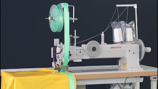 Long arm sewing machine with webbing dispenser for canvas tents & silt curtains