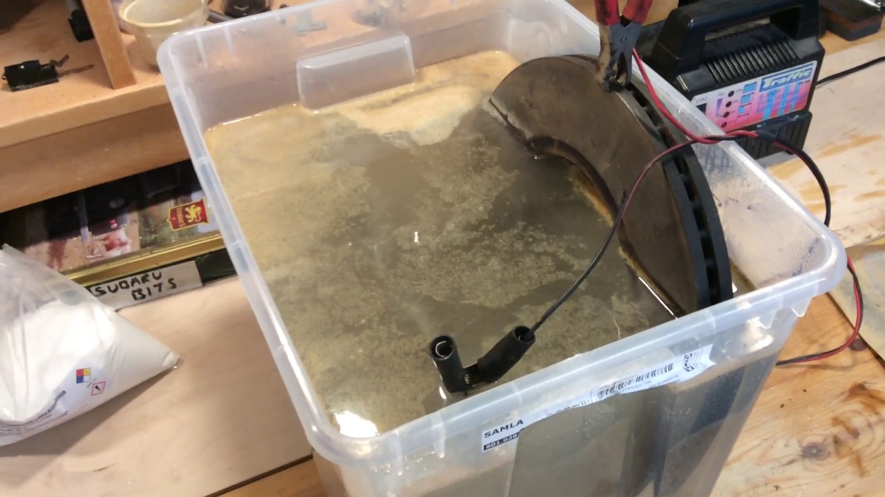 Axe head rust removal reverse electrolysis (part 1) YouTube