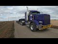 Heavy haul Tri-Drive Peterbilt Moving an Oversize Caterpillar D7 Dozer Show Trucks