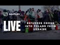 LIVE: Ukrainians cross over the border into Poland