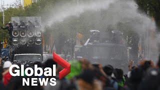 Anti-government protesters, police clash in Thailand despite expanded COVID lockdown