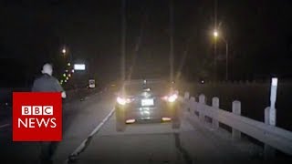Drunk driver crashing into police officer - BBC News