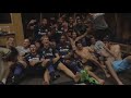 Players celebrate in the locker room after making the playoffs
