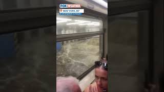 Commuters Trapped On Subway As Floodwater Surges At New York City Station