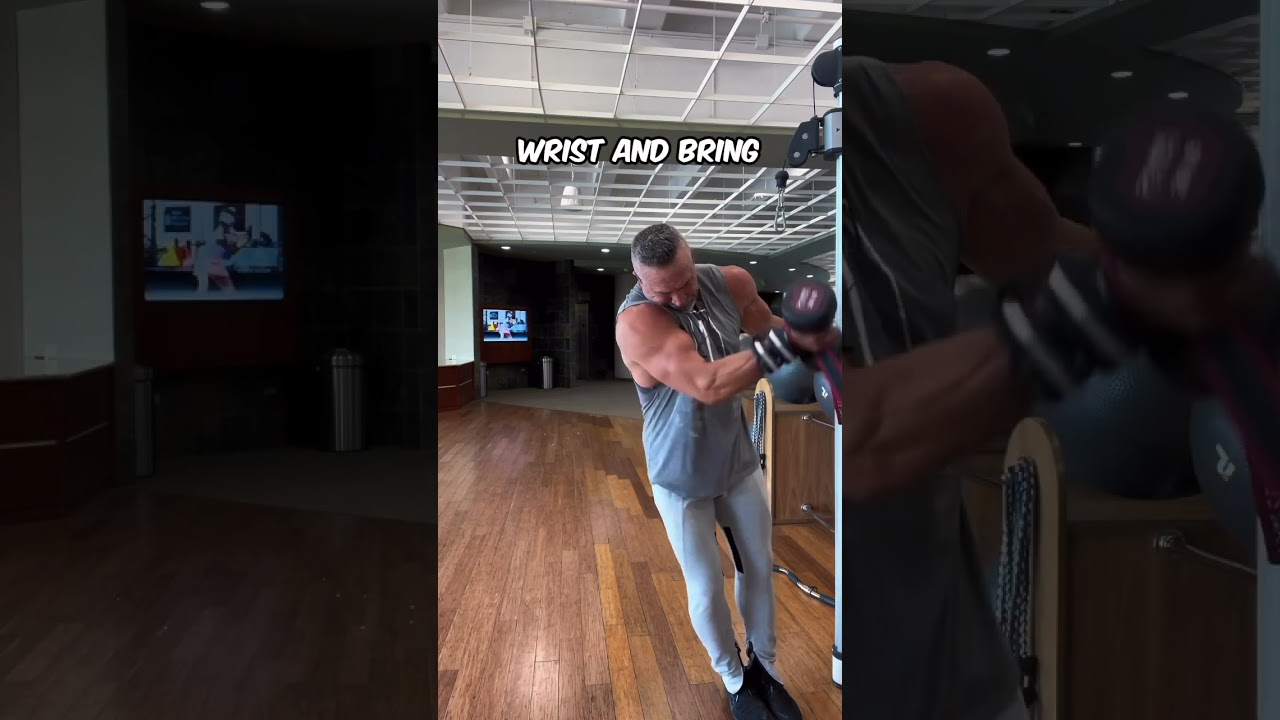 To add some extra emphasis on the upper pec when you’re doing your one arm standing scoop flyes,