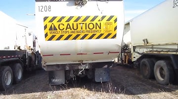 GovDeals: 2011 Mack LEU Sideloading 37 Yard Labrie EX101121A