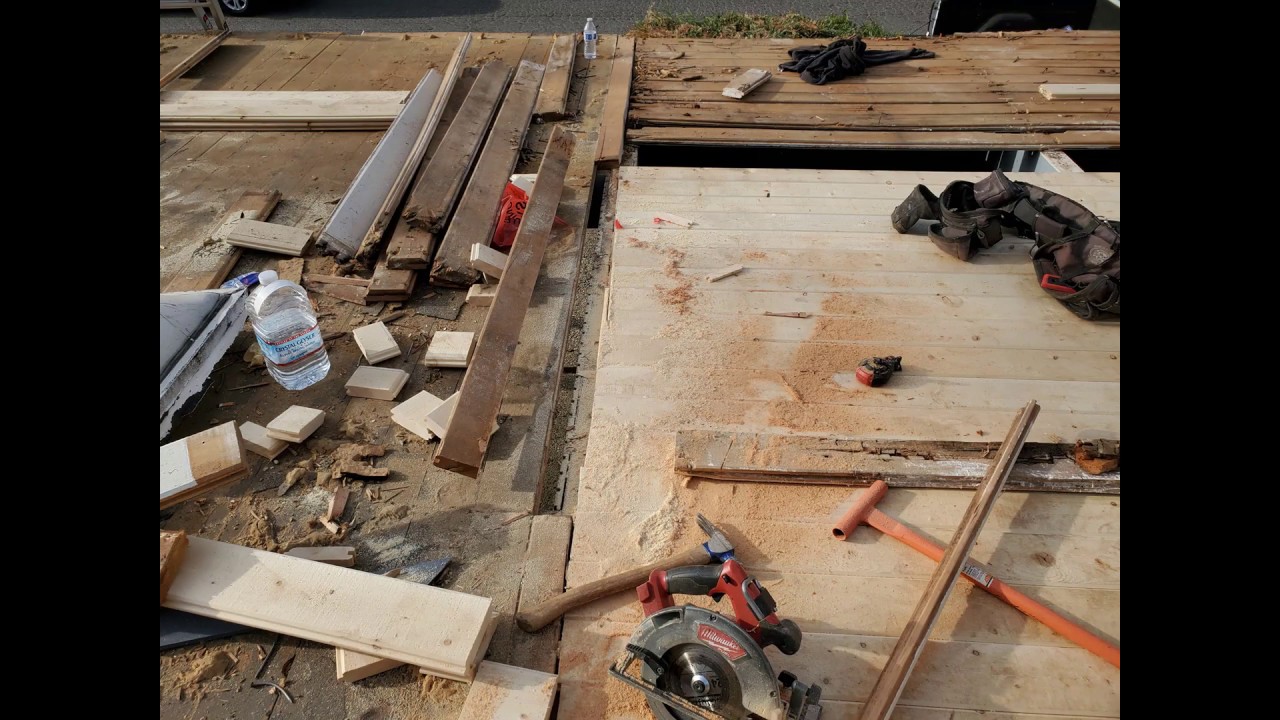 dry rot on the flat deck roofing repair wood work leaking roof roofer