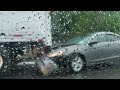 parked semi truck gets rear ended by a car