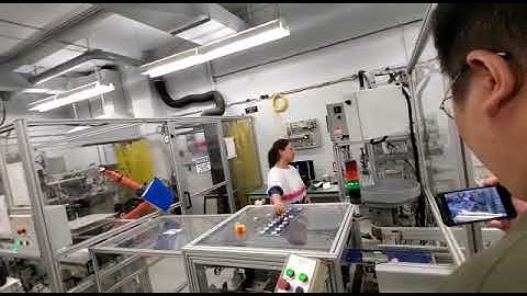 FANUC ROBOT WORKING CENTENNIAL COLLEGE ROBOTICS AND AUTOMATION COURSE