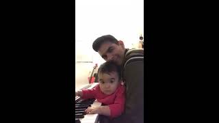 Chloe and Daddy playing music for mommy