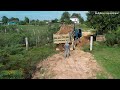 New Clutter Rocky Soil In The Field Equivalent To A Concrete Road With Dozer KOMAT'SU &amp; Dump Truck