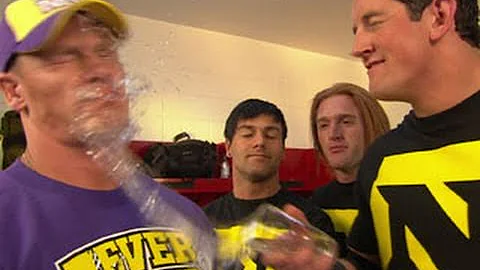 John Cena gets splashed in the face with water by ...