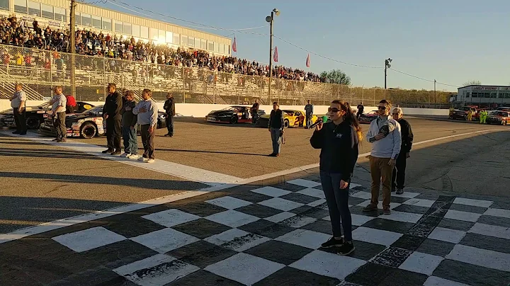 Christina Sherman sings the National Anthem at Lan...