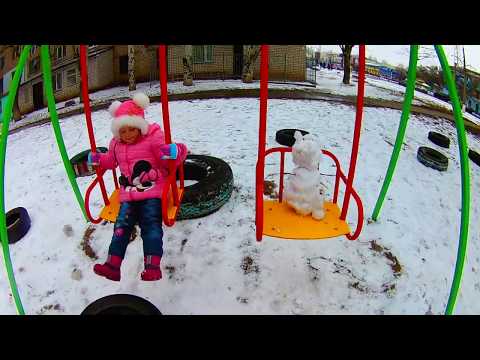 Diana made the world's smallest snowman and rolled it on a swing. VLOG