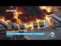 Massive fire at Compton industrial complex rips through structures, buses | ABC7