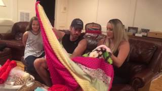 Will and Lauren opening Popsie's baby shower gift